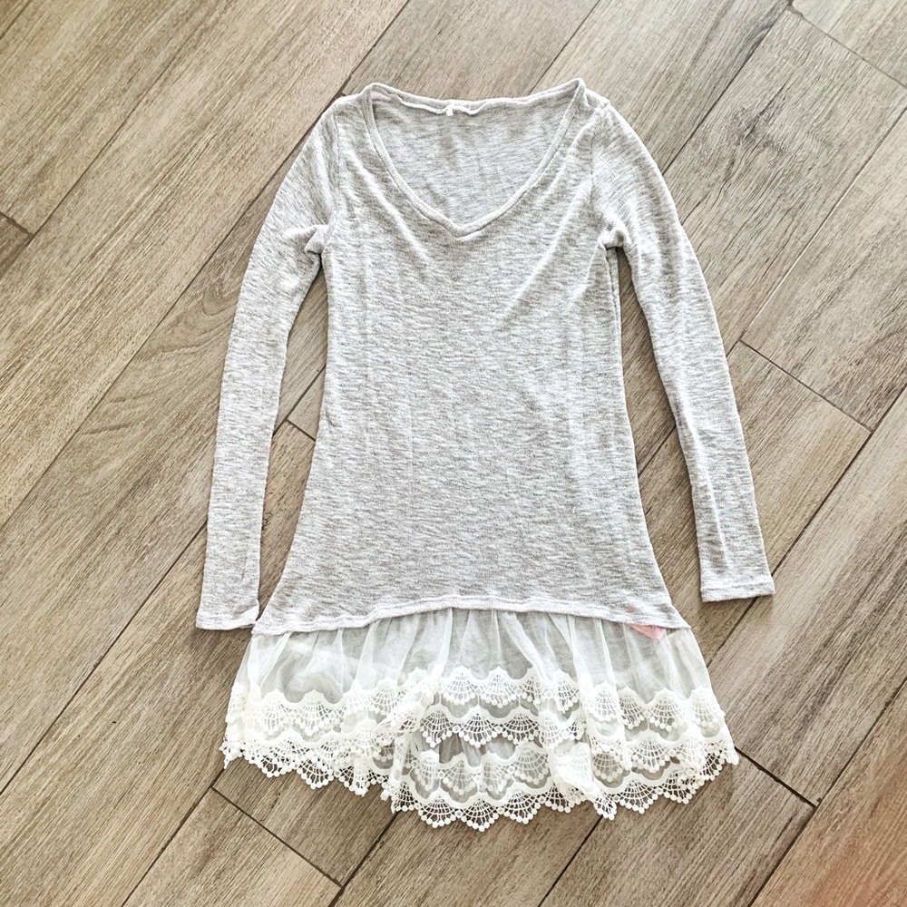 Cute lace bottom sweater!